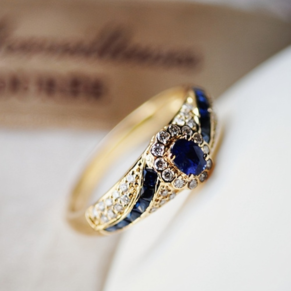 Women Formal Wear Designers - One elegant gold alloy ring paired