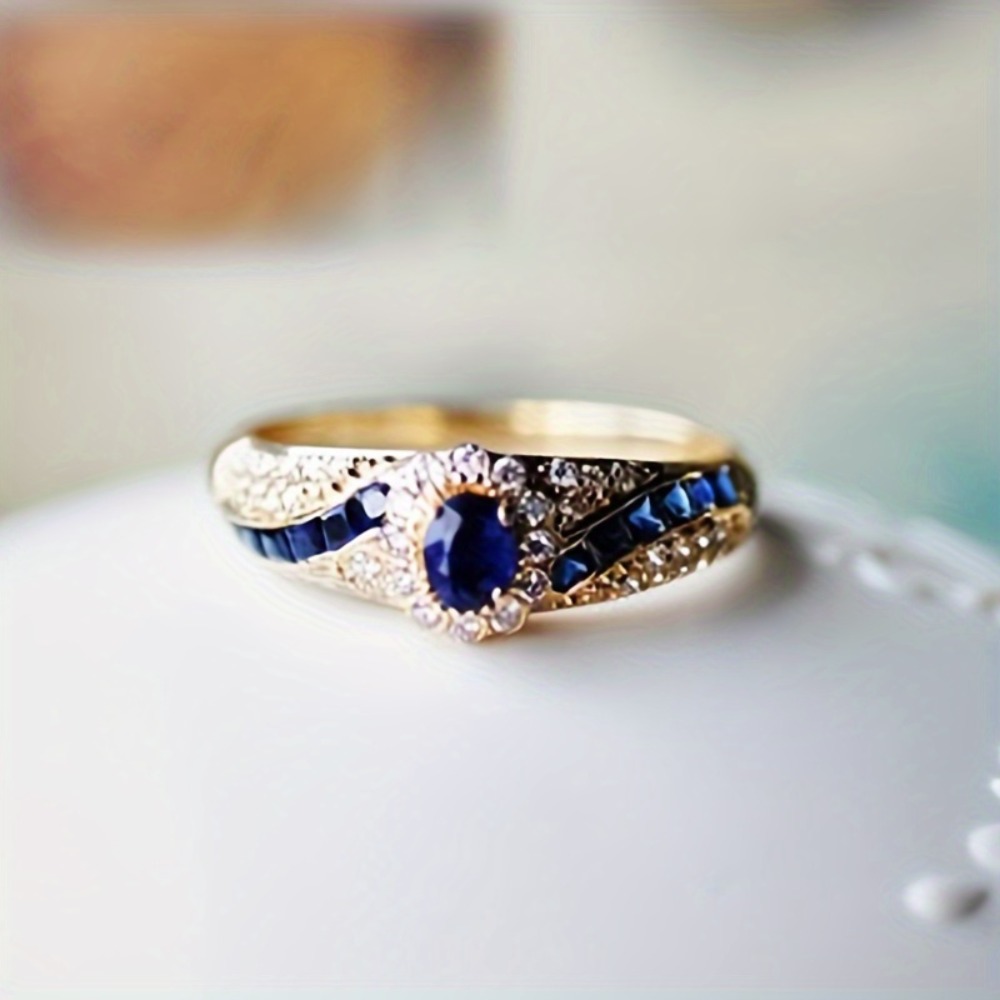 One elegant gold alloy ring pa - Women Formal Wear Designers avaliação e preço